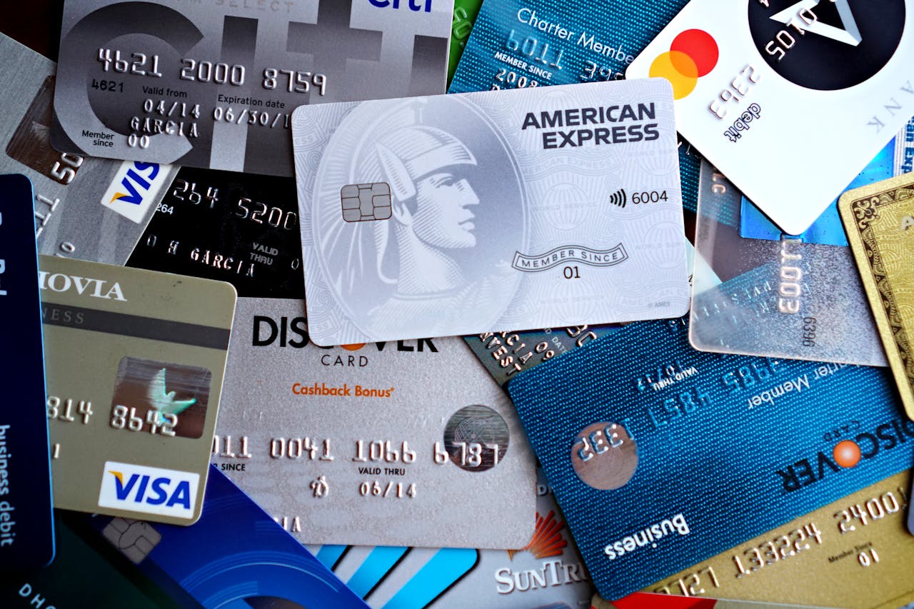 services-02 Close-up image of various credit and debit cards including Visa, MasterCard, American Express, and Discover.